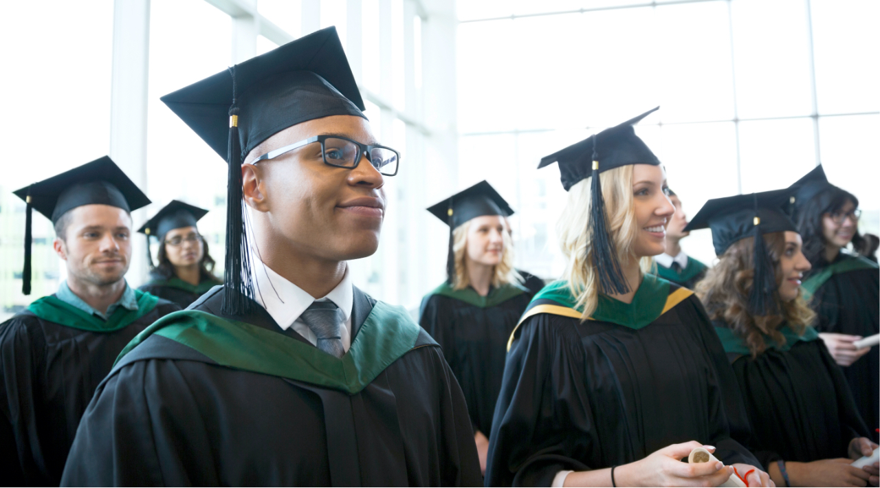 group of young people wearing graduation caps and robes