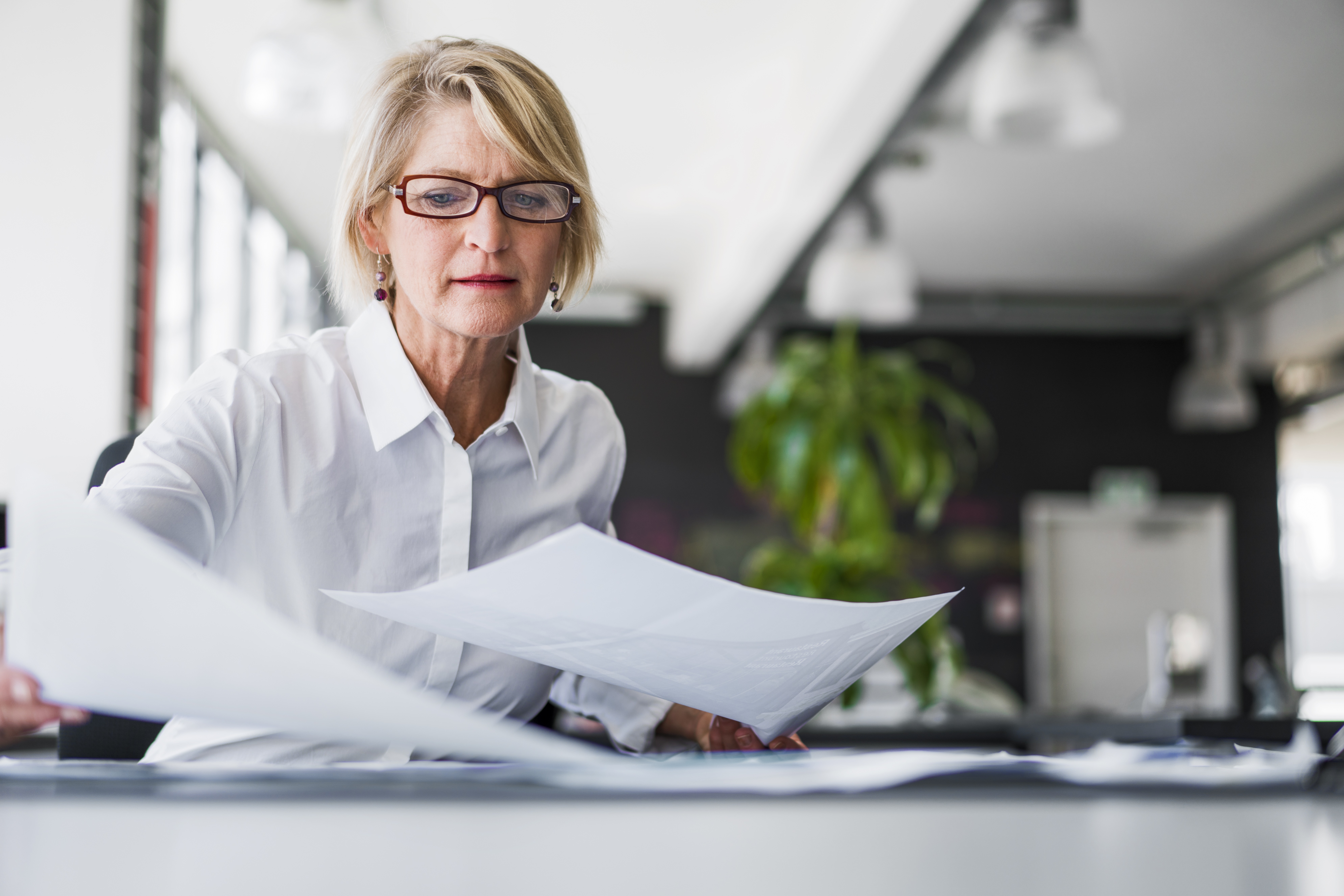 Woman looking at files