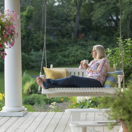 Lady sitting on a swing