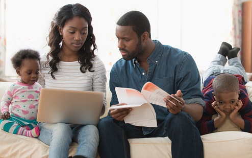 Family looking at documents