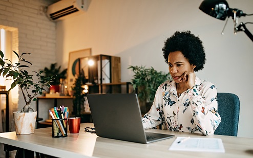 Woman looking at computer